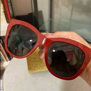 Red sunglasses With yellow velvet box